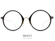 Les lunettes optiques Tom Ford TF5703-B sont de très belles montures combinées. De grandes lunettes rondes ayant une face en acétate et les branches en métal doré. 