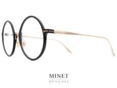Les lunettes optiques Tom Ford TF5703-B sont de très belles montures combinées. De grandes lunettes rondes ayant une face en acétate et les branches en métal doré. 